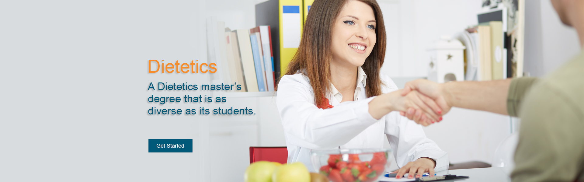 A young female nutritionist consults with a client. Learn to apply cutting-edge information in food, nutrition, food service management, and wellness with this online master’s degree in dietetics that is as diverse as its students.